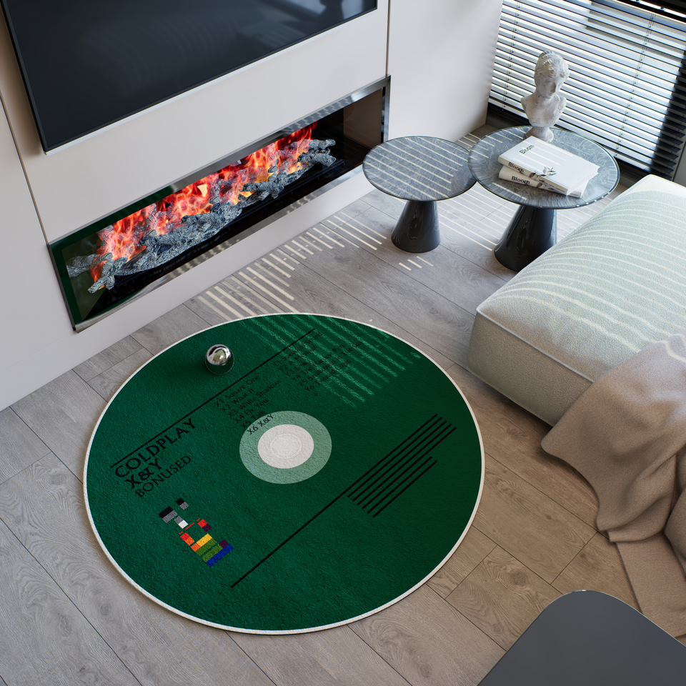 A modern living room featuring a round green rug designed like a Coldplay album cover with 